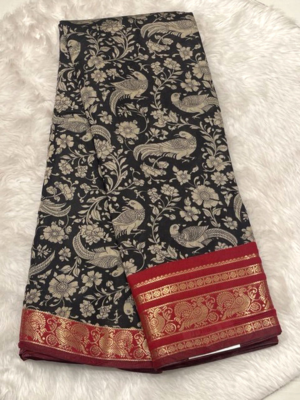 Cream Chhagal silk saree with multi-color Kalamkari floral print and a wine-red contrast gold zari border.