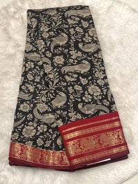 Cream Chhagal silk saree with multi-color Kalamkari floral print and a wine-red contrast gold zari border.