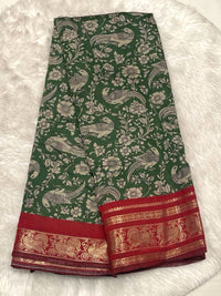 Mustard yellow Chhagal silk saree with traditional Kalamkari art and a navy blue contrast gold zari border.