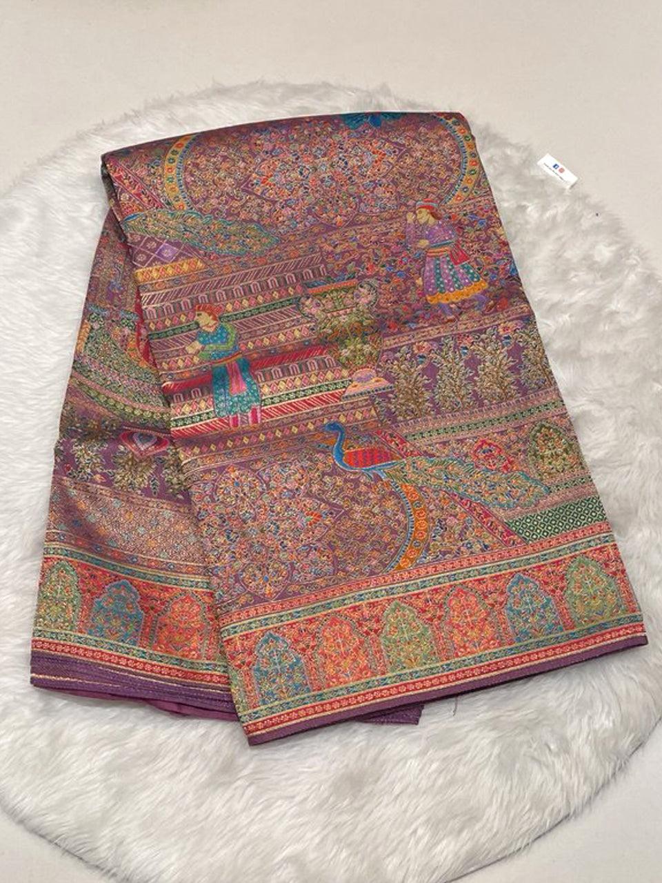 Purple Cora Fancy Designer Saree featuring royal Rajput figures and meenakari border