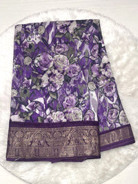Deep purple crushed texture saree with vintage floral bloom print and intricate zari border.