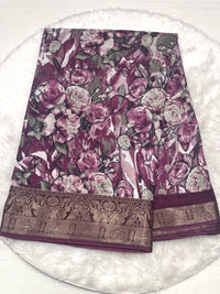 Wine magenta crushed fancy saree with all-over floral design and wide golden zari border.