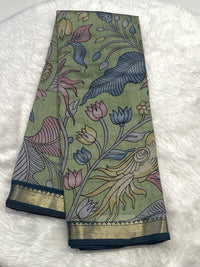 Olive Green Maheshwari saree with multi-color kalamkari motifs and zari border.