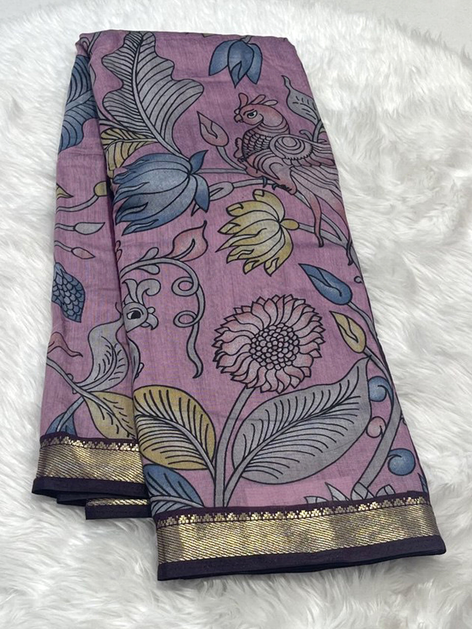 Rose Pink Maheshwari saree with traditional pen kalamkari design and gold zari border.