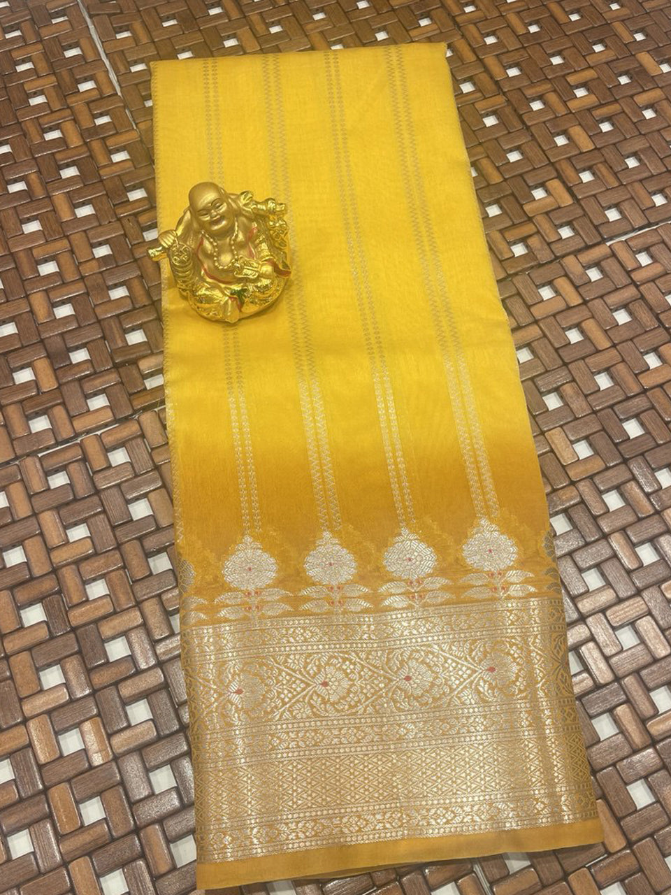 Yellow Chiniya Fancy Saree with standing zari lines and grand antique floral border for festivals.