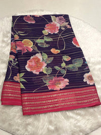 Deep Purple Micro Chiffon saree with multi-color flowers and magenta contrast border.