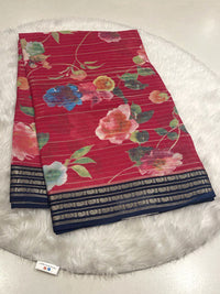 Red Micro Chiffon saree with floral design, horizontal zari stripes, and navy blue border.