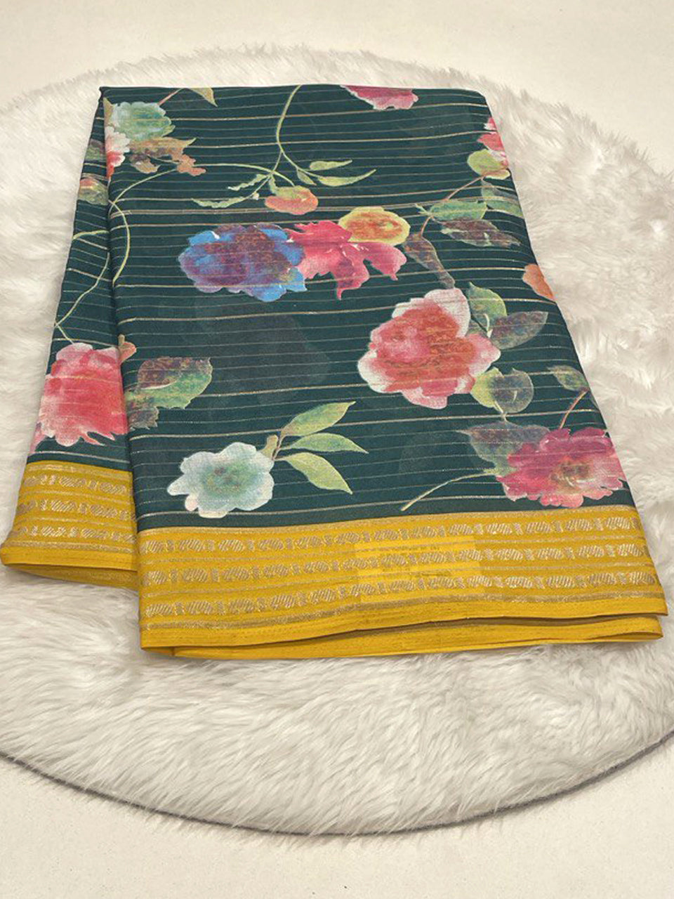 Bottle Green Micro Chiffon saree with floral print and mustard yellow contrast border.