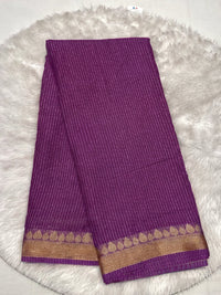 Deep magenta purple georgette saree with shimmering gold lines and zari border