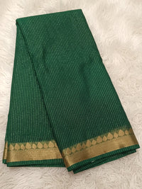 Forest green georgette saree with gold zari stripe work and traditional border