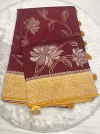 Maroon wine Russian viscose silk saree with mustard yellow border and matching tassels.