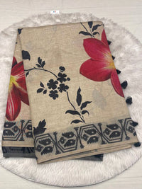 Beige semi Tussar printed saree with red flowers, black vine motifs, and a black woven leaf design border.