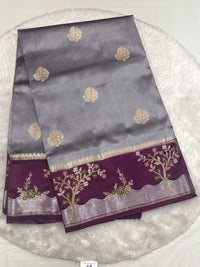 Deep red mango silk saree featuring a coral pink designer border.