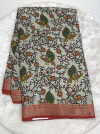 Vibrant magenta pink Icon Silk saree with all-over floral and bird embroidery and a detailed silver scalloped border.