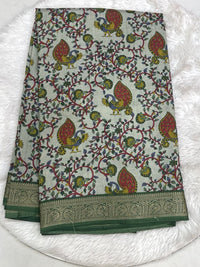 Elegant dark purple Icon Silk saree showcasing all-over multi-work bird and flower embroidery with a silver scalloped edge.