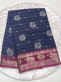 Navy blue tussar soft silk saree with pink neem zari border.