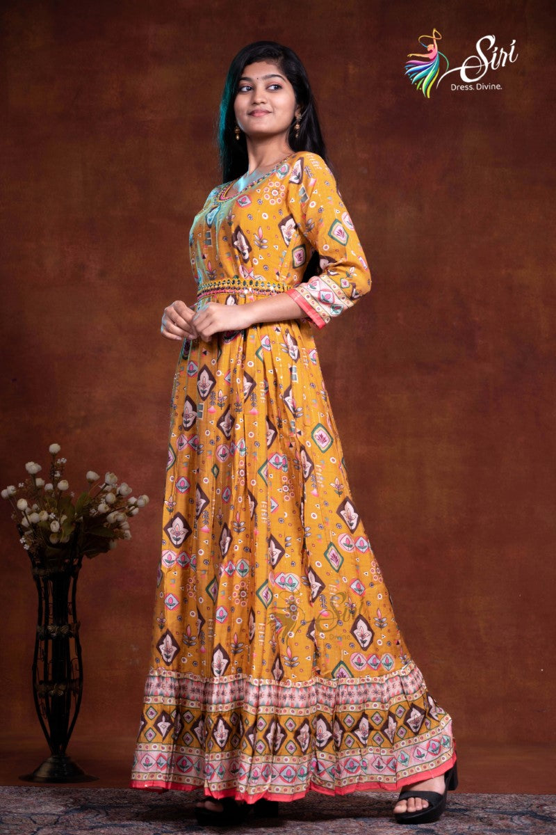 Ryan Fabric Mustered Yellow Floral Print And Thread Work Kurti
